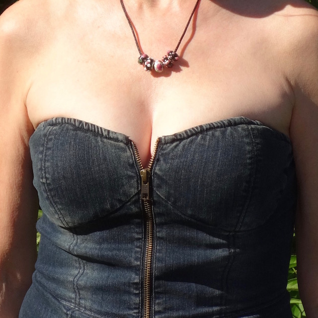 bustier closeup and necklace